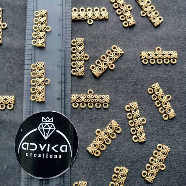 Gold and Silver Metal 5 hole connector