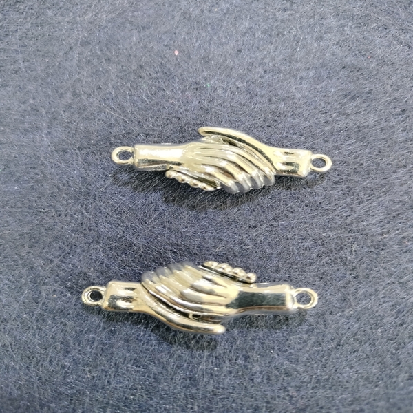 silver hand magnet charm