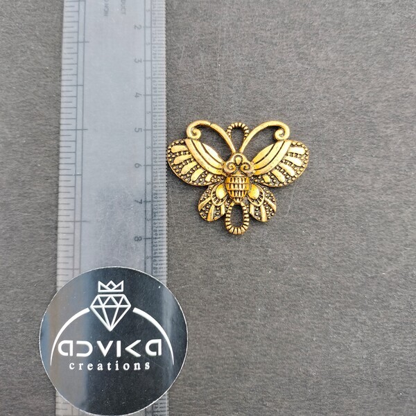oxidised golden butterfly pendant