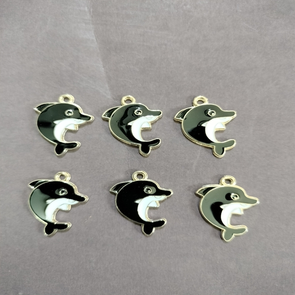 black and white dolphine charm