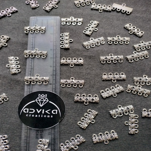 Gold and Silver Metal 4 hole connector