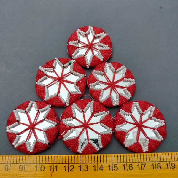 Embroiderd round mirror