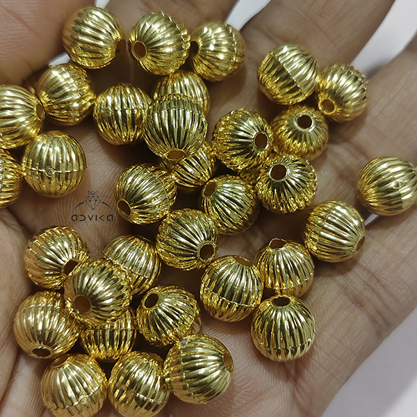 Acrylic designer bead golden