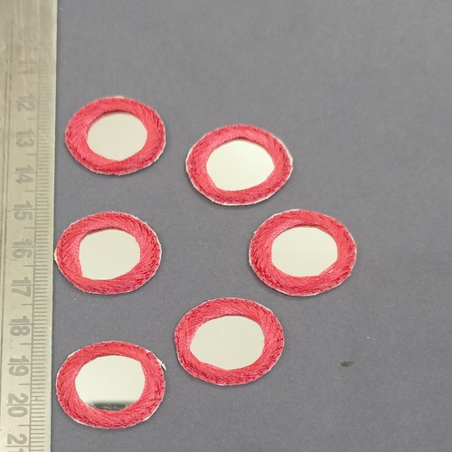 embroiderd round mirror